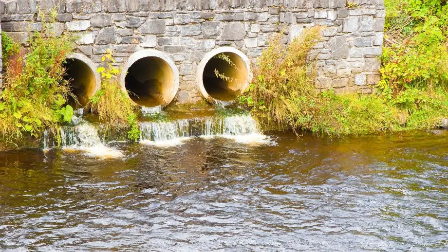 Concrete drainpipe into river