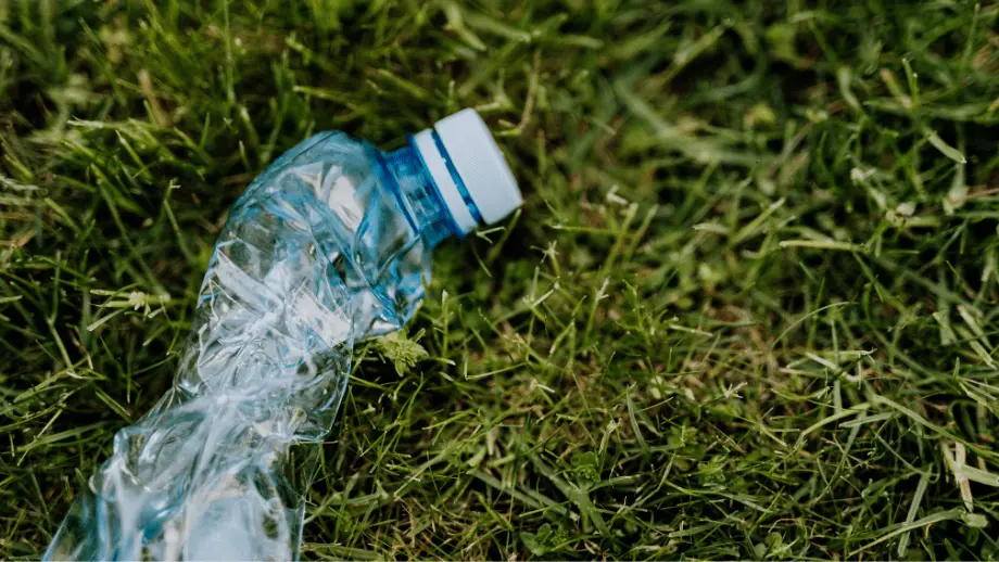 Plastic bottle in glass