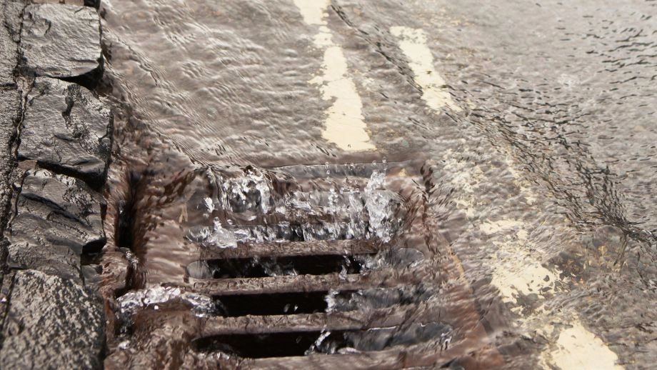 Water pouring down drain